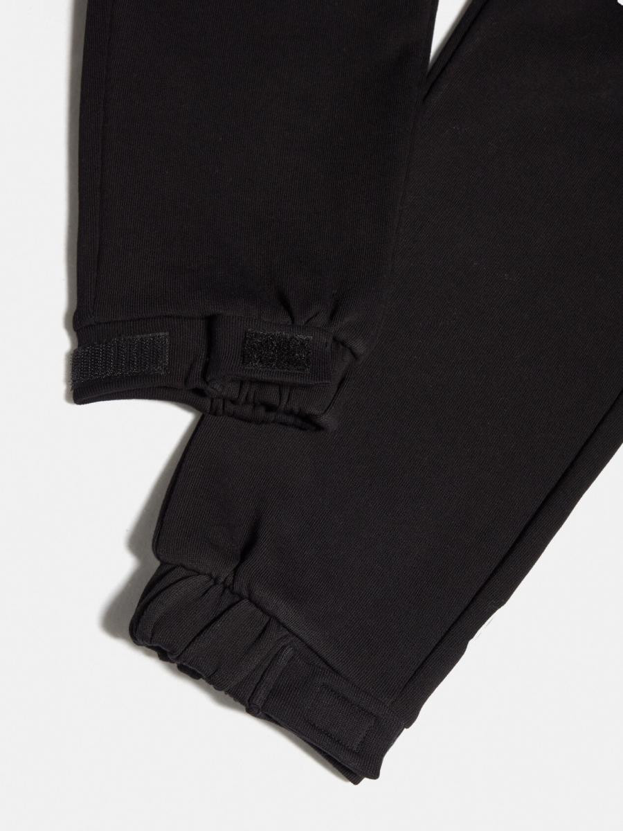 Sisley young dečija trenerka donji deo 