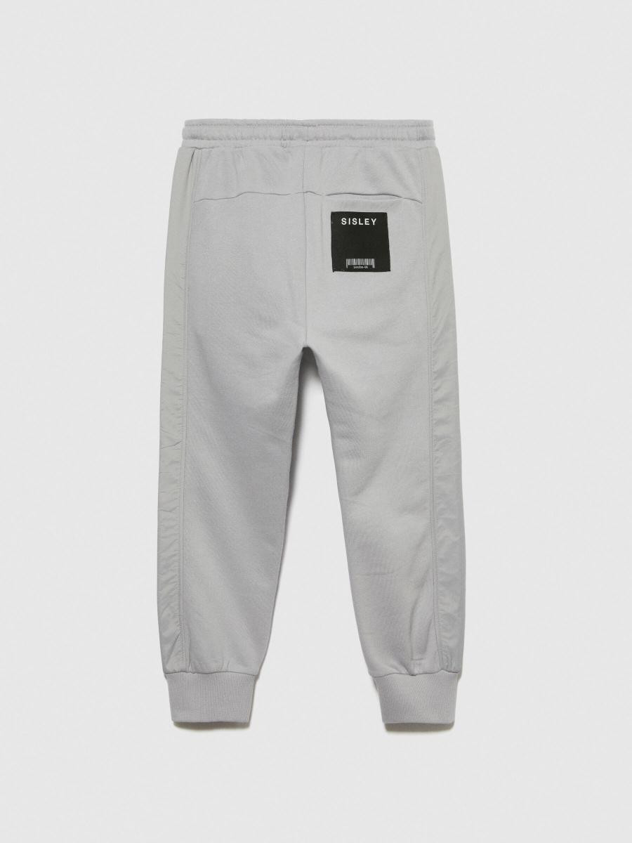 Sisley young dečija trenerka donji deo 