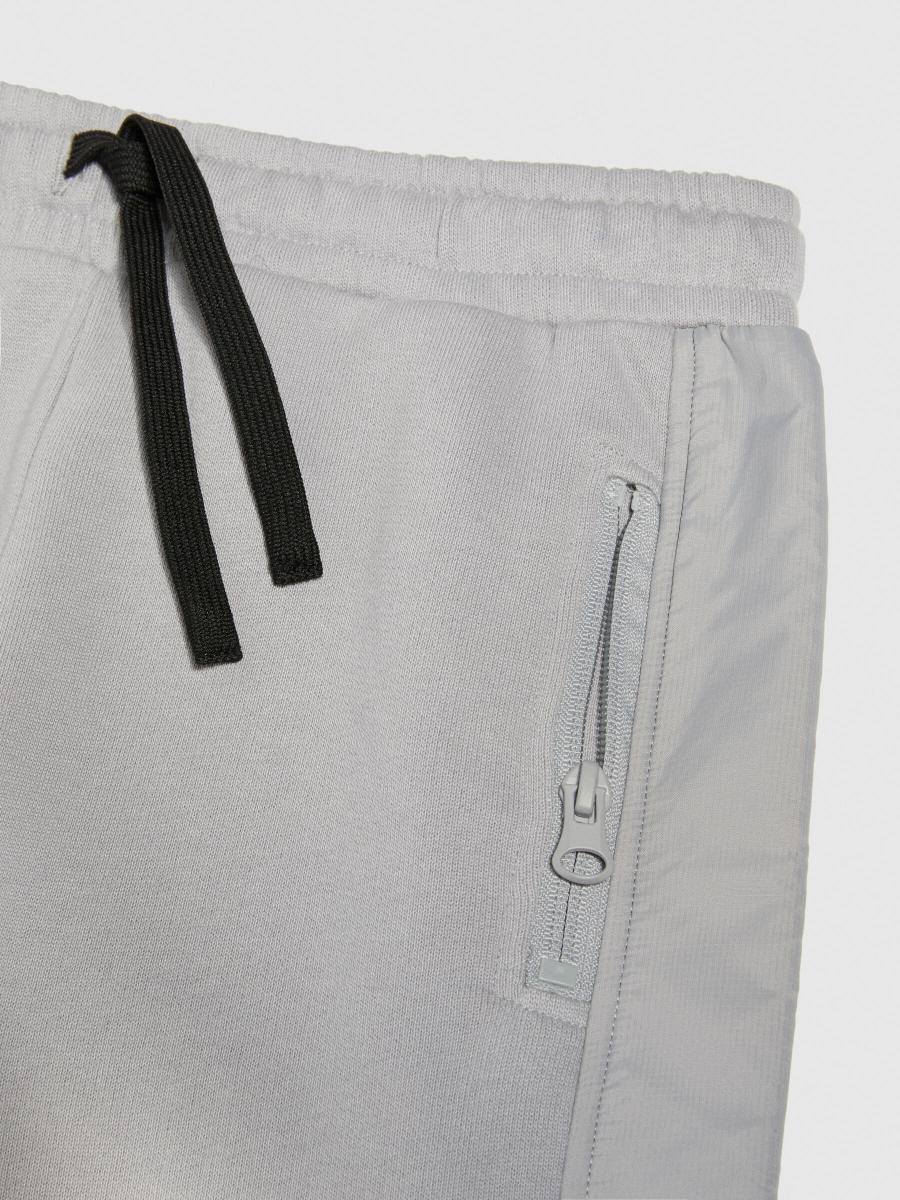 Sisley young dečija trenerka donji deo 